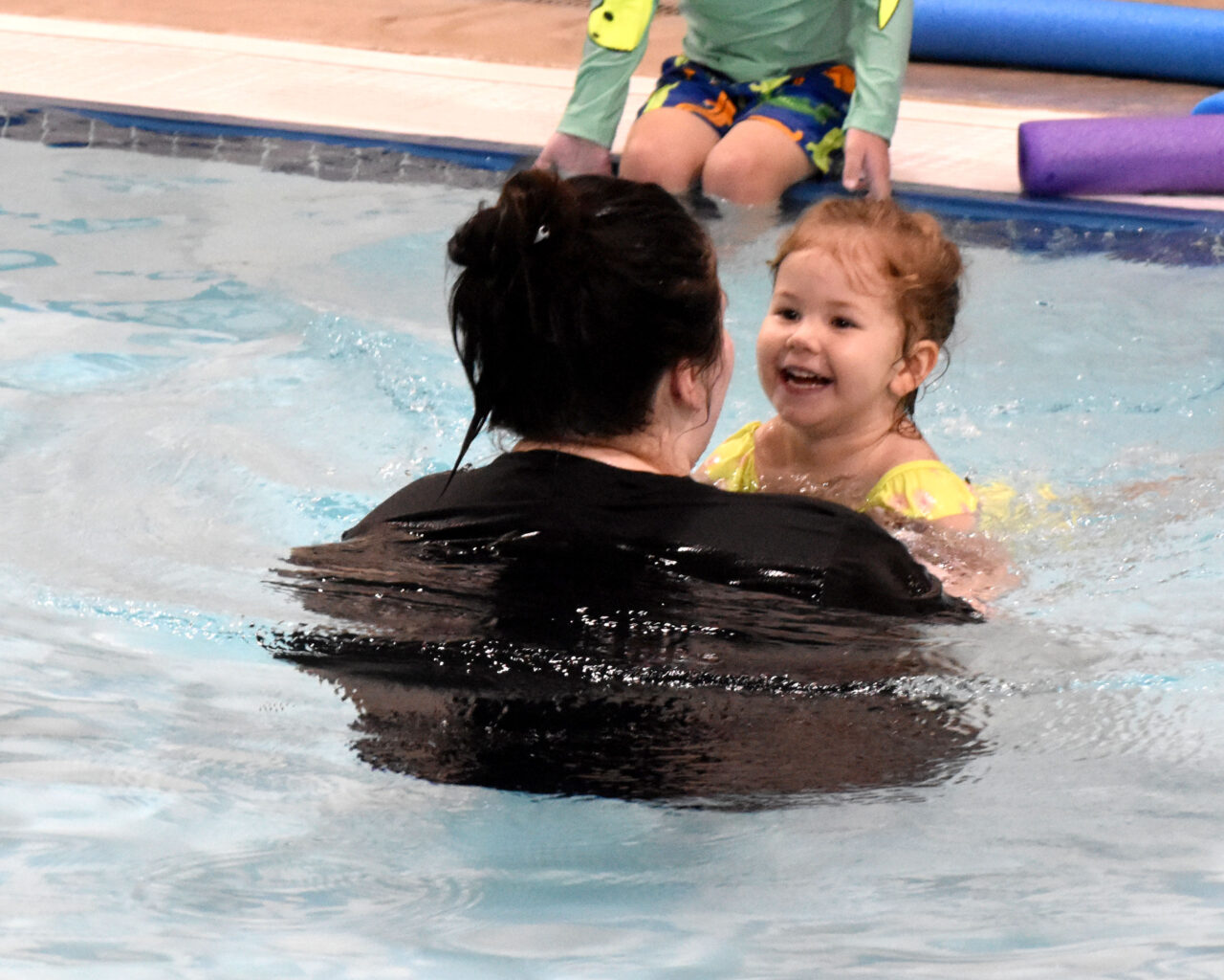 Private swim lesson girl smiling